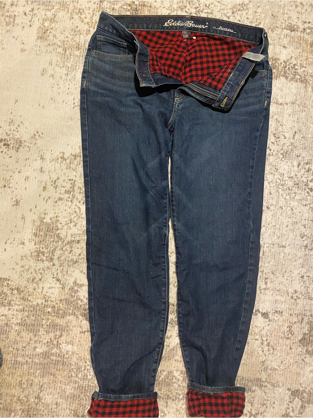 Eddie Bauer Men’s Navy Jeans with Red Plaid Lining
